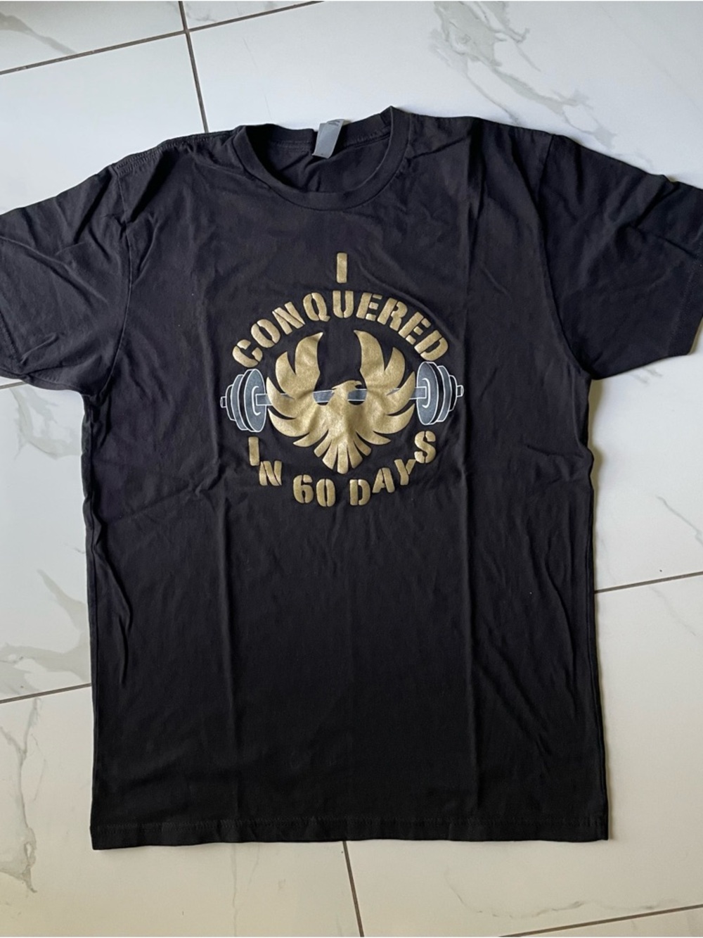 Next Level Apparel Black Short-Sleeve Tee with Gold Fitness Crest